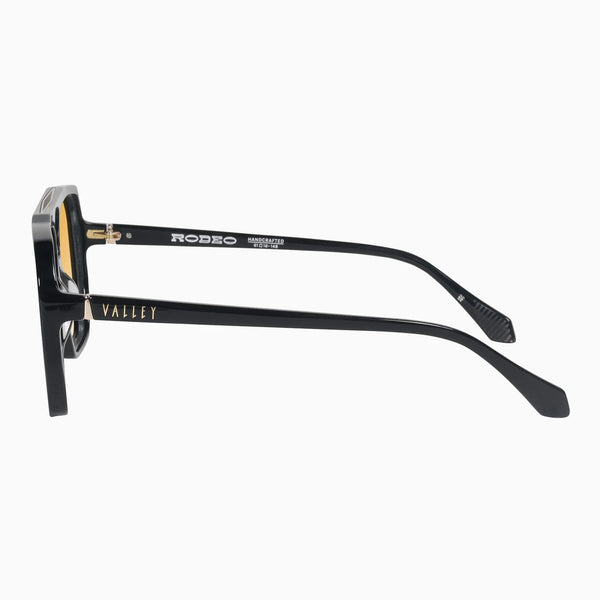 Rodeo- Gloss Black w. Gold Metal / Orange Gradient Lens