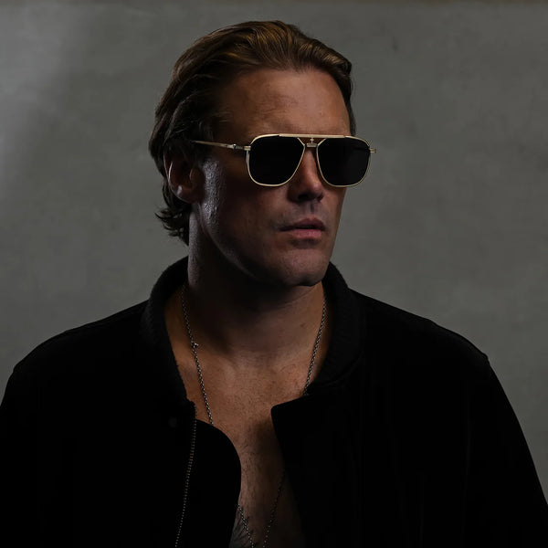 Capita- Brushed Gold Titanium / Black Lens