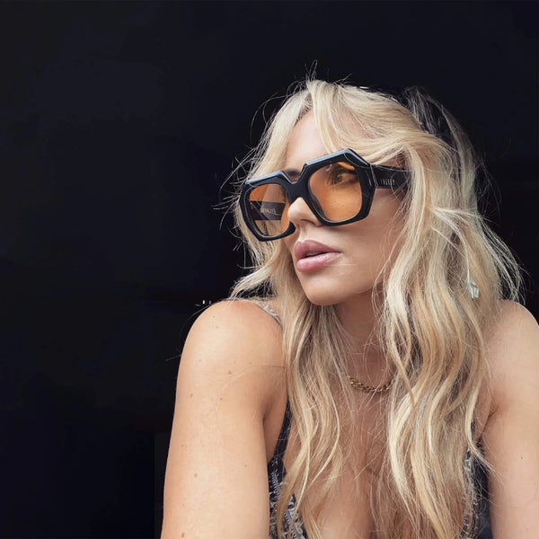 Monolith Gloss Black w. Silver Metal Trim / Orange Gradient Lens