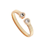 Extravaganza rose gold bangle fixed with white crystals