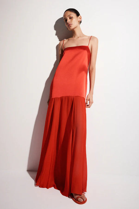 moraya dropped waist maxi dress Effortlessly elegant in the Shona Joy Moraya Dropped Waist Maxi Dress Featuring a luxe satin acetate bodice, a semi-sheer georgette skirt, and the perfect dropped waist silhouette for a timeless, flowy