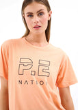 HEADS UP TEE IN CANTALOUPE